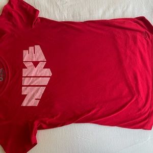This is medium slim fit red Nike with a light red Nike on top never worn before